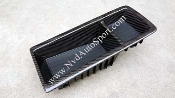 bmw e82 e88 1m carbon fiber skinning rear storage tray by NVD Autosport