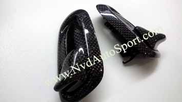 Porsche 911 991 Carbon fiber skinning seat release levers and panels from NVD Autosport